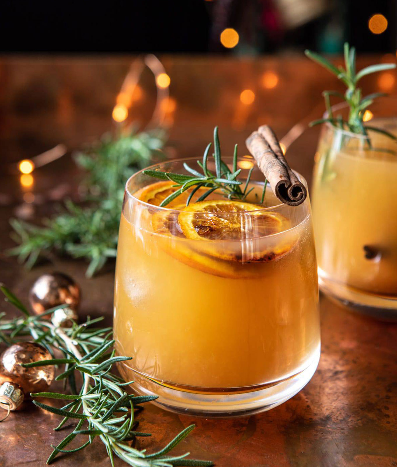 valentine's day cocktails: cinnamon bourbon old fashioned with bruleed orange