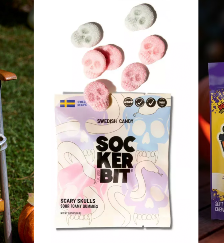 feastables chocolates on skeleton's lap with skull gummies and sour patch kids