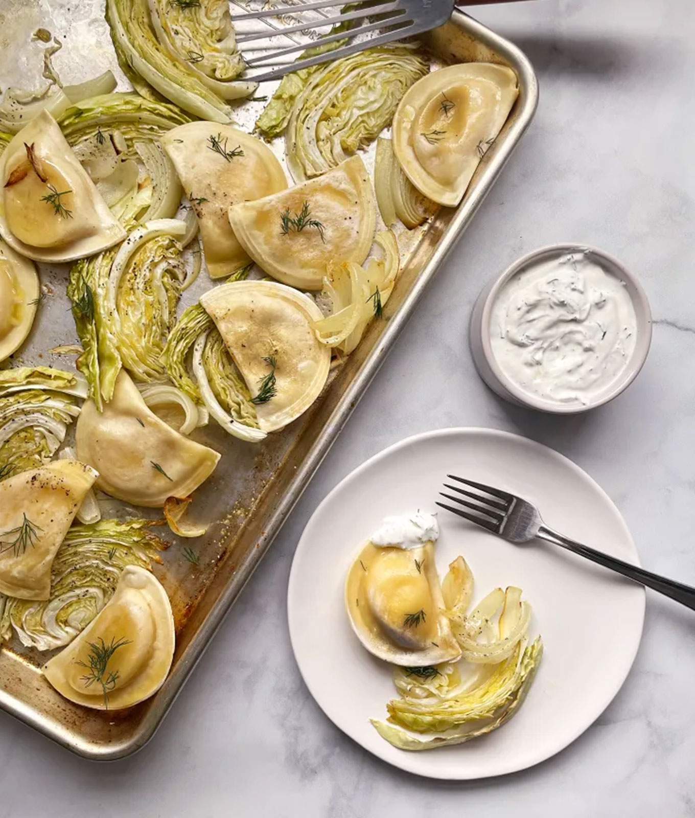 december dinner recipes: sheet pan pierogi with roasted cabbage, onions and dill