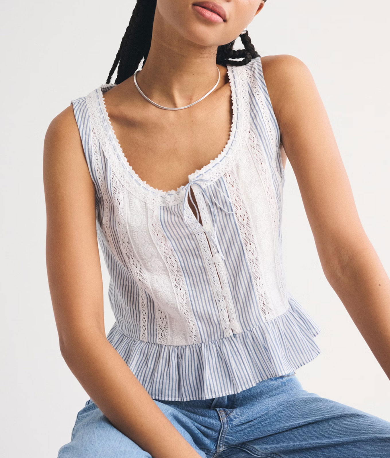 story ruffle blue lace tank