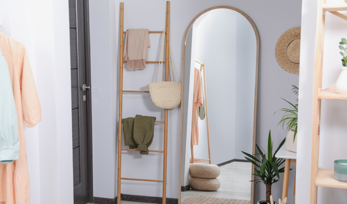 arched mirror in white room