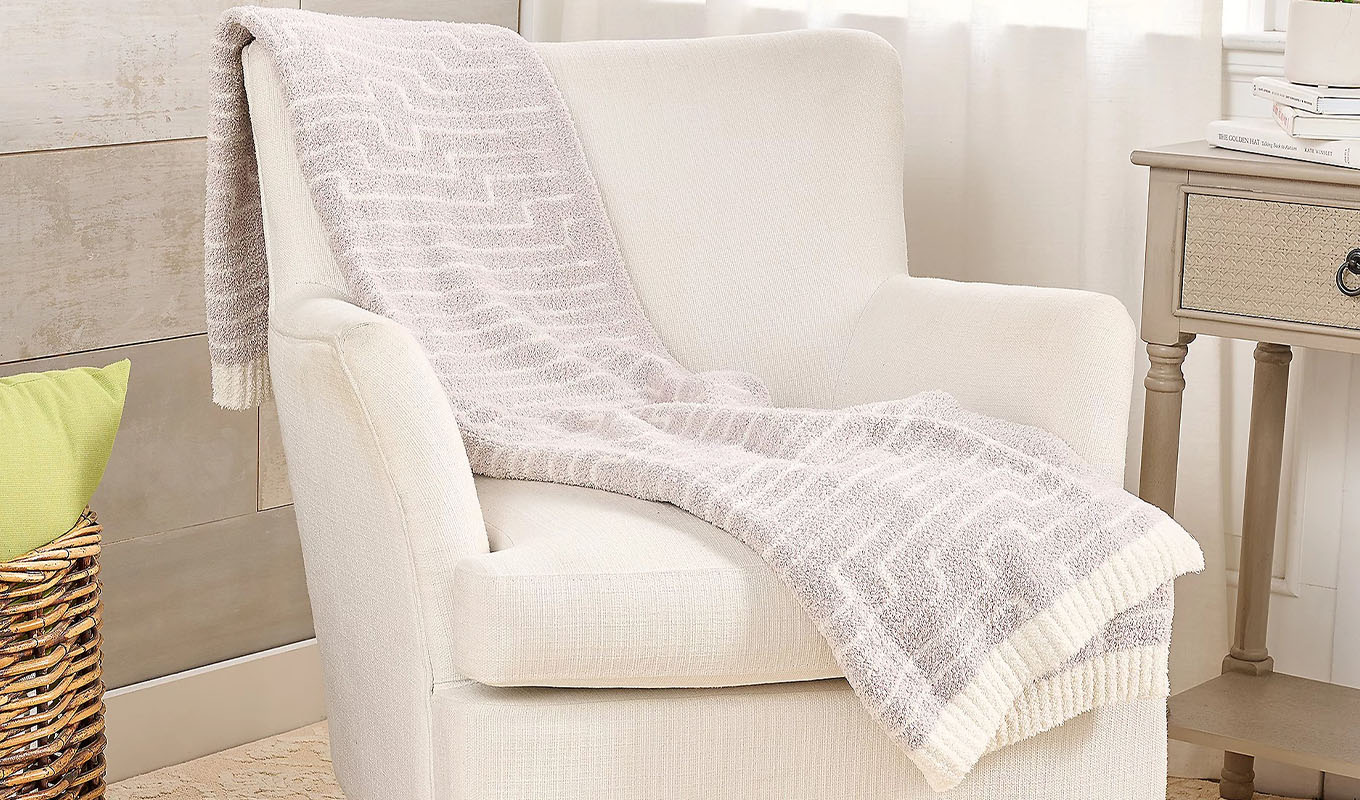 The Barefoot Dreams CozyChic Diamond Stripe Blanket.