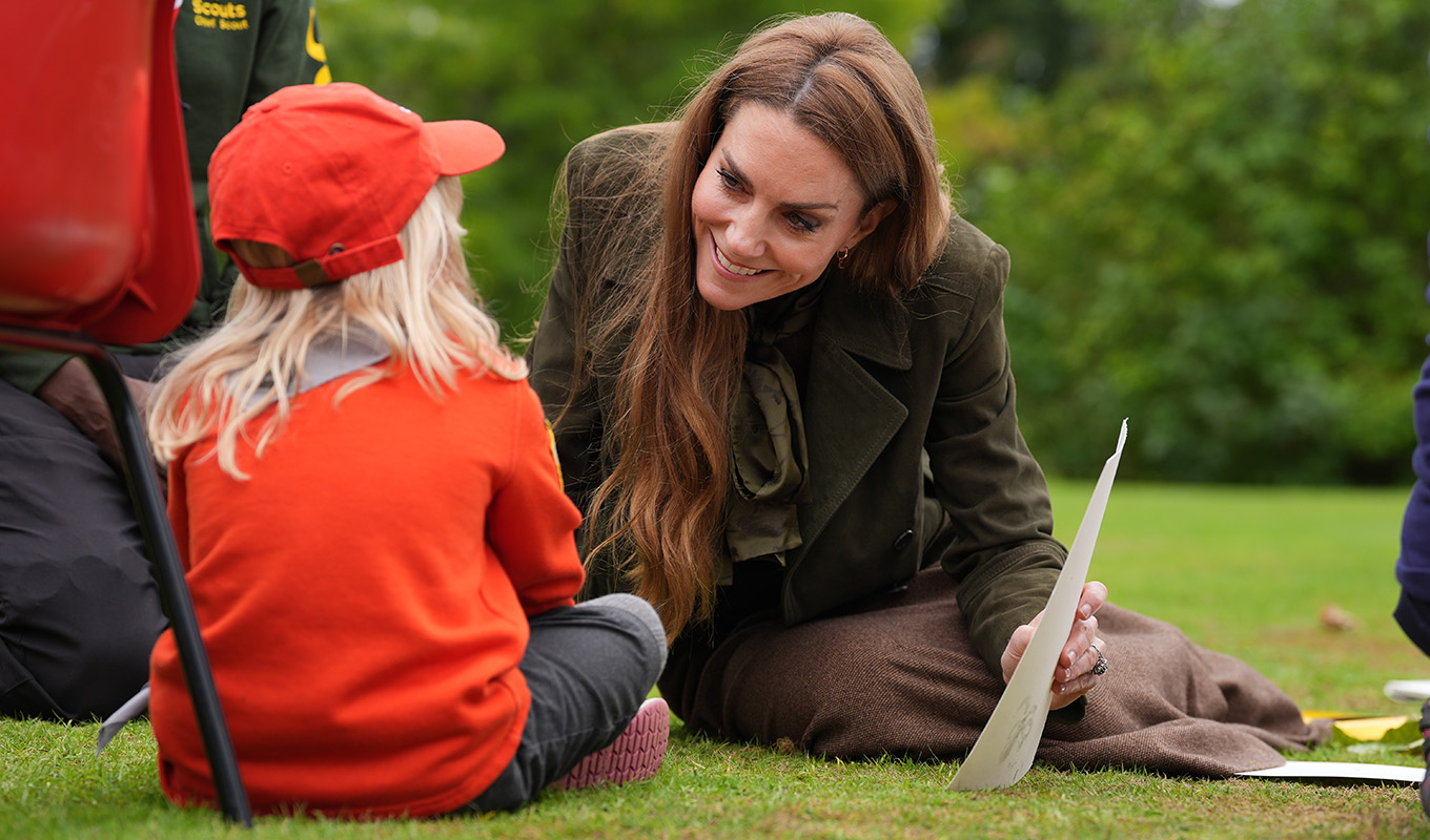 Duchess Sophie copes Kate Middleton; Kate speaking to a child