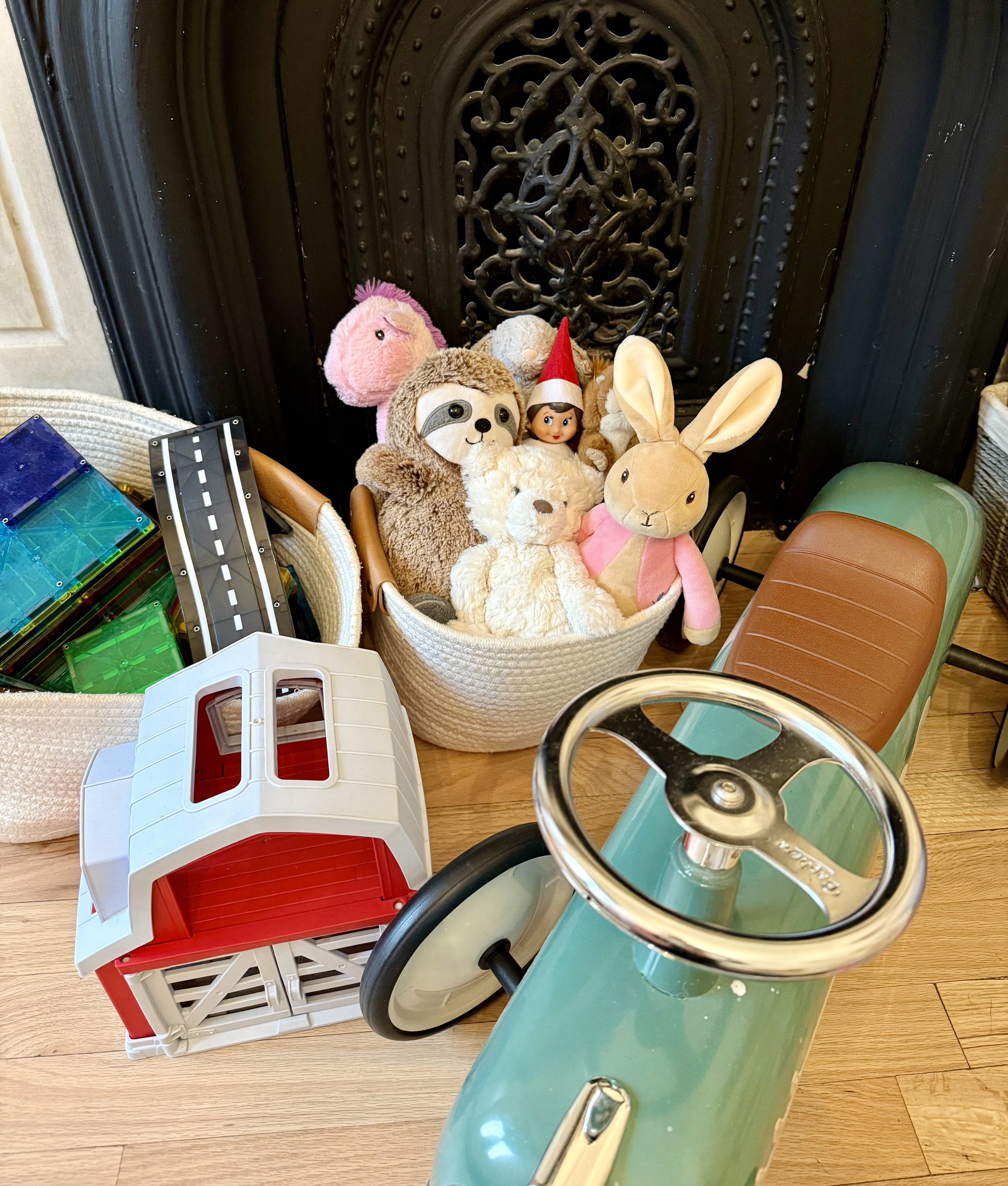 elf amid toys in box