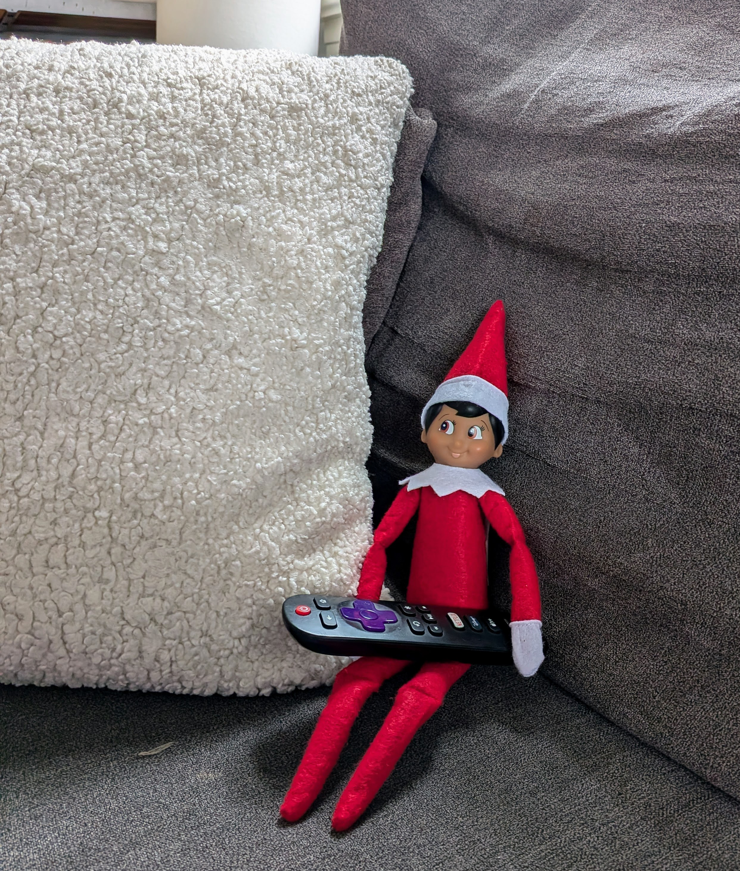 elf holding remote