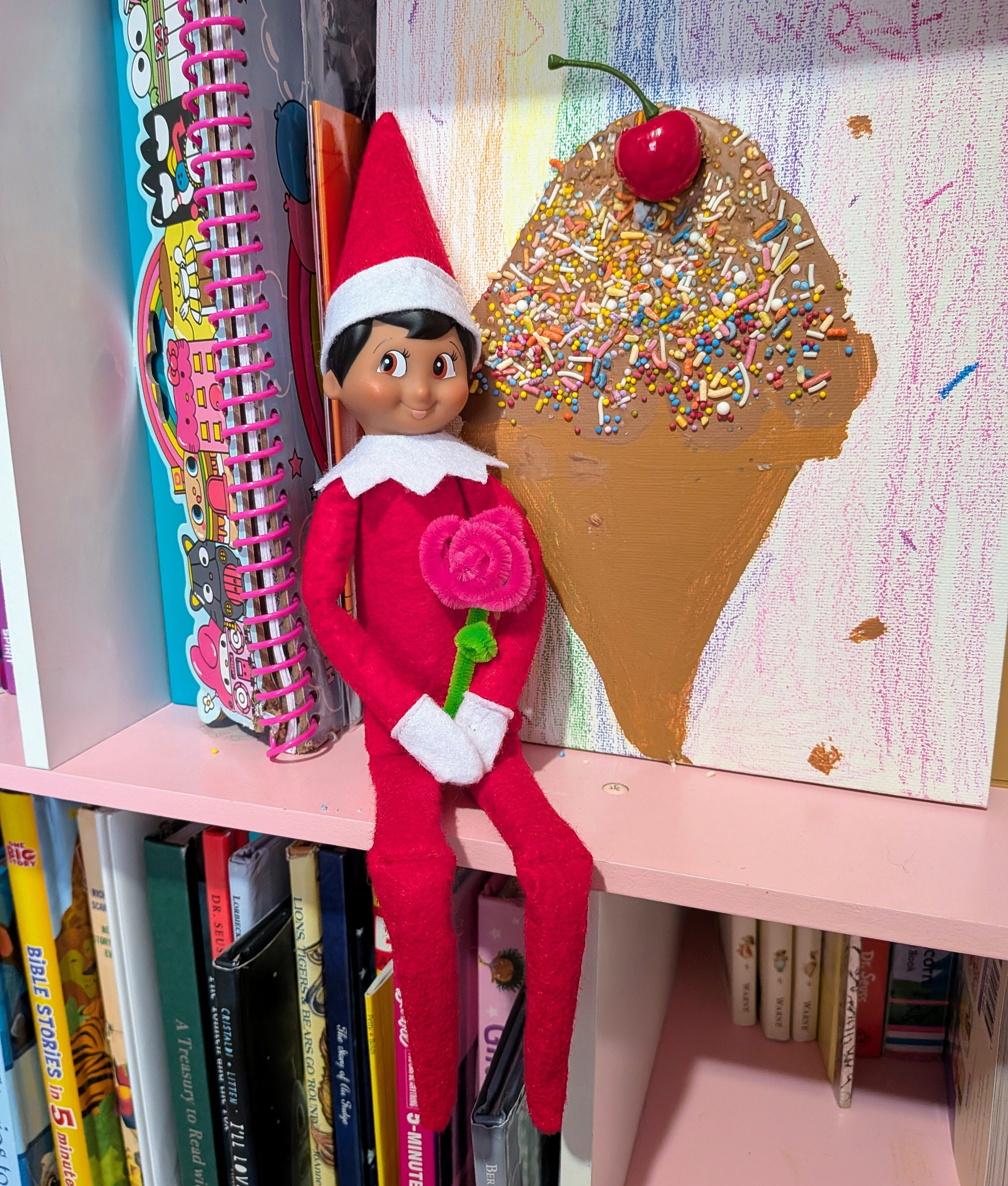 elf holding pipe cleaner rose