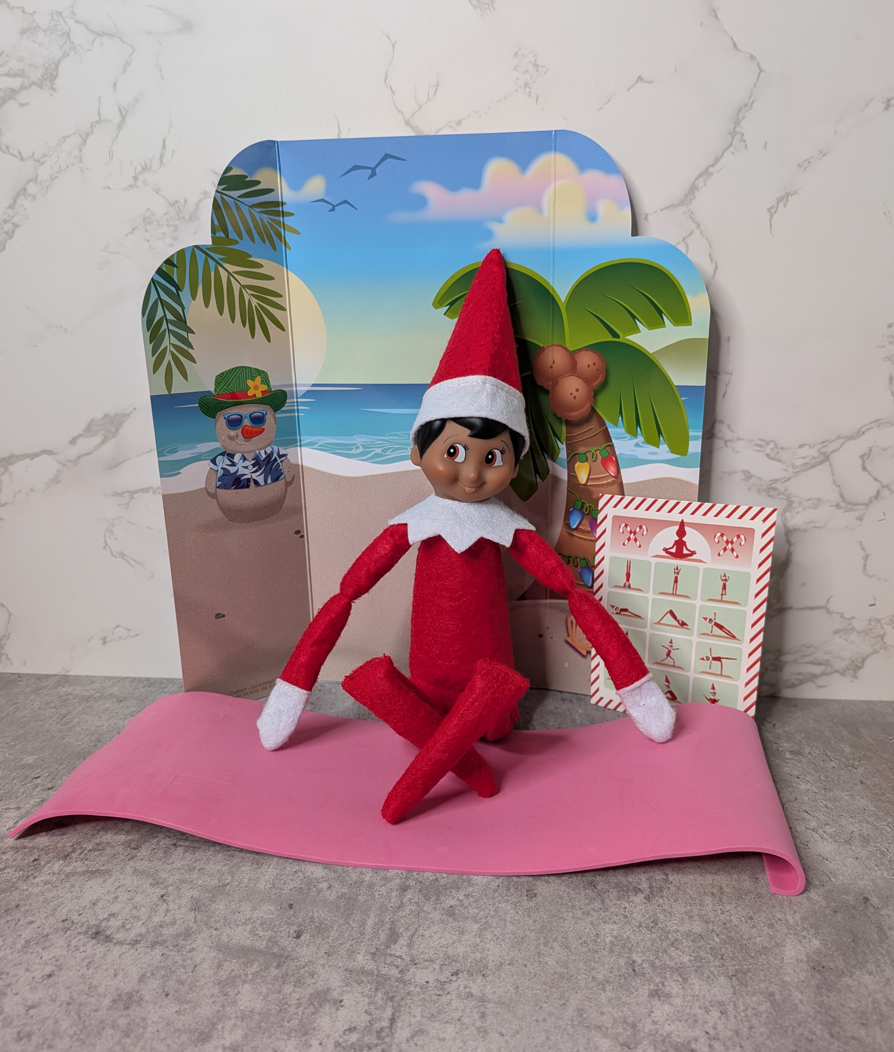 elf on shelf doing yoga
