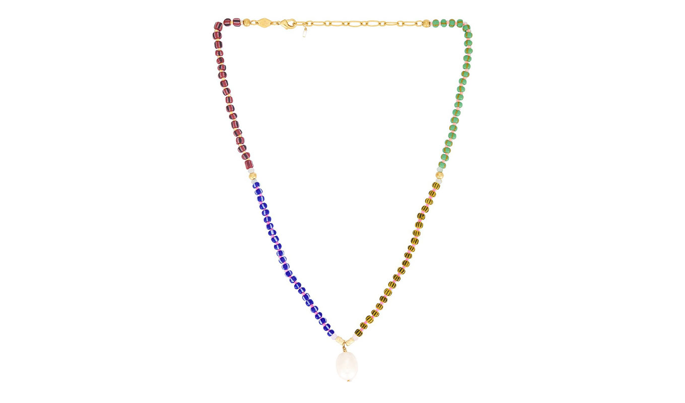 how-to-layer-necklaces-like-a-french-woman: a rainbow colored bead necklace