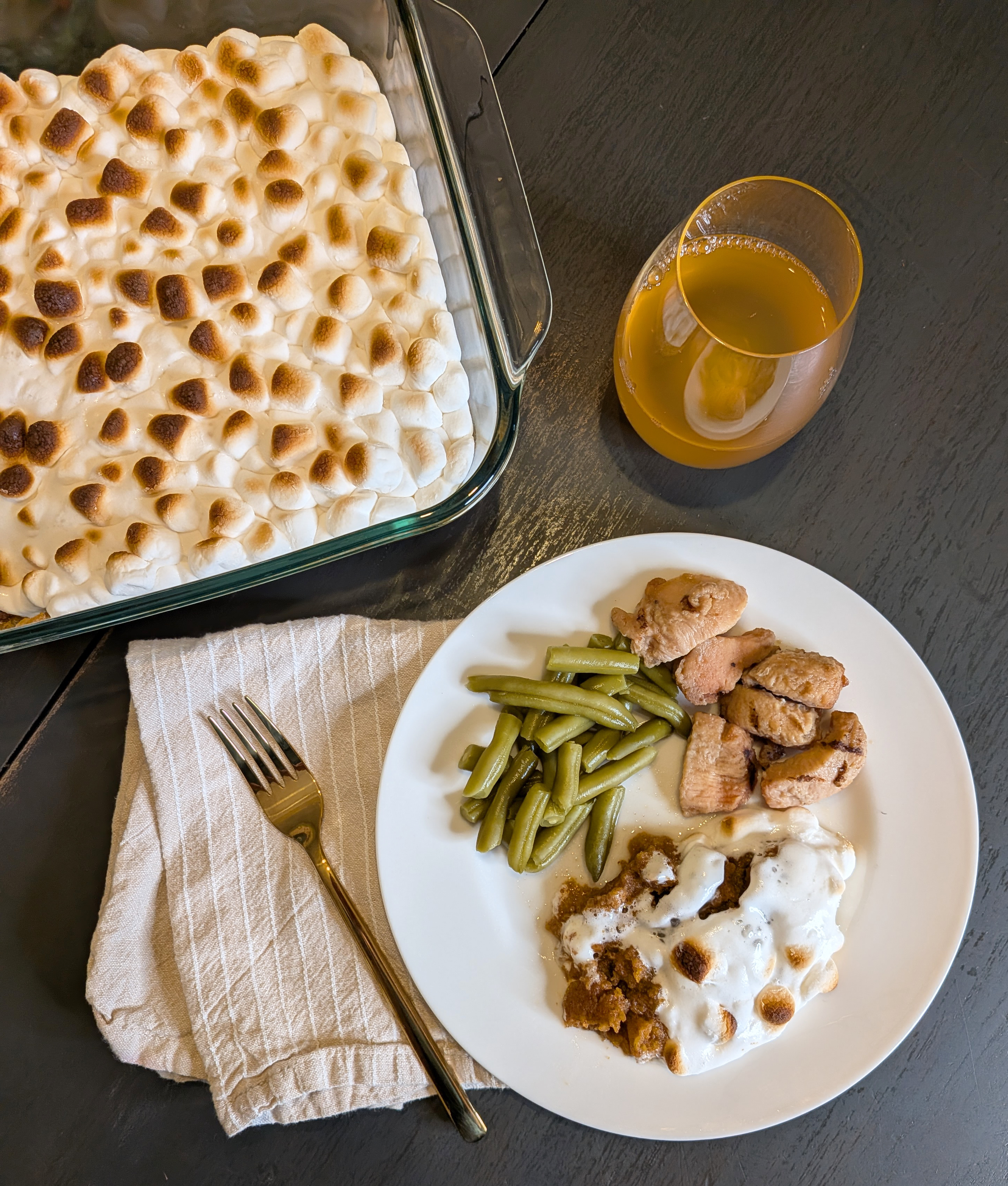 jennifer garner's grandma's sweet potato pudding next to chicken and green beans