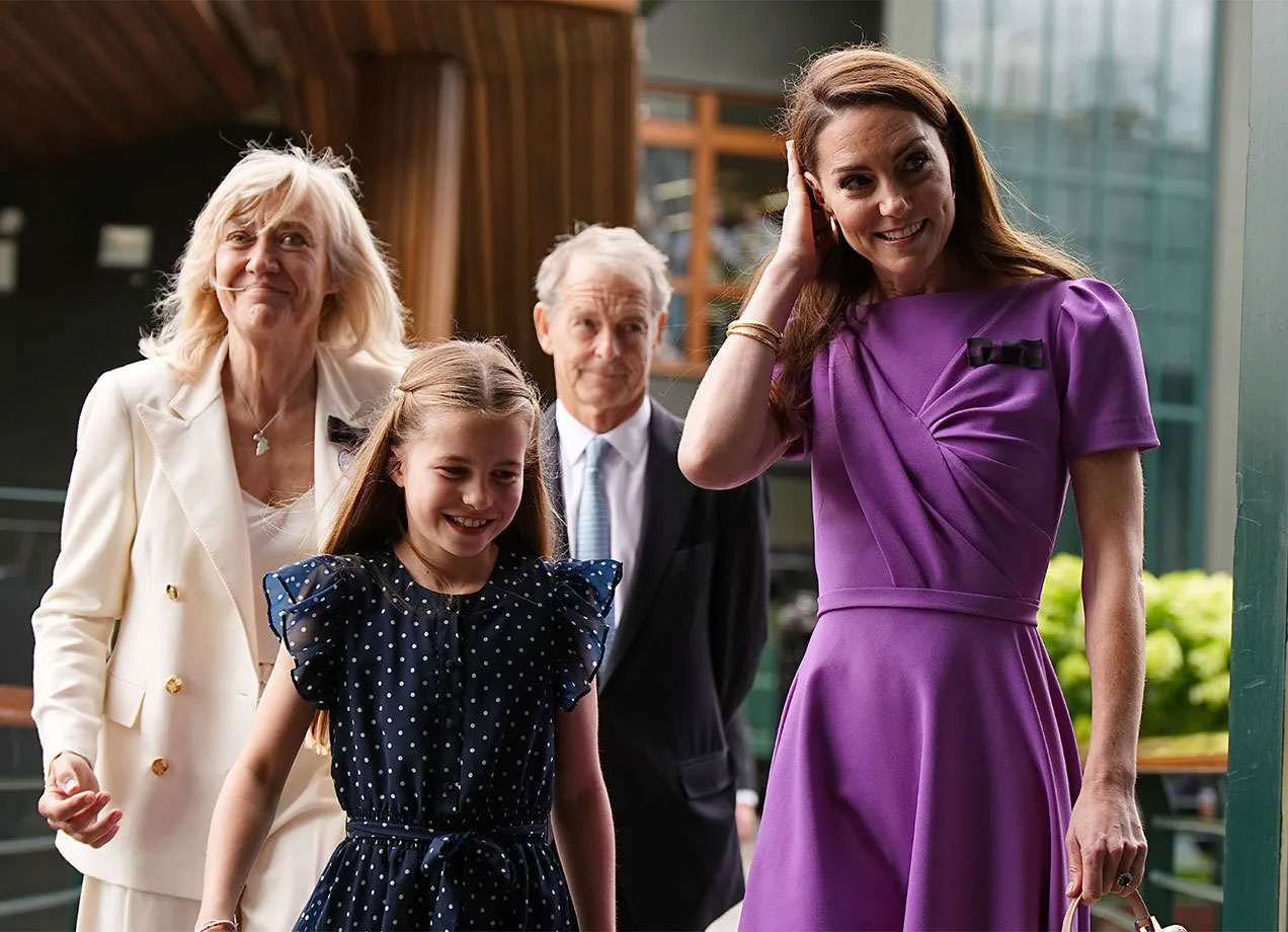 kate middleton hair move: kate middleton tucking her hair behind her ear alongside princess charlotte and two others