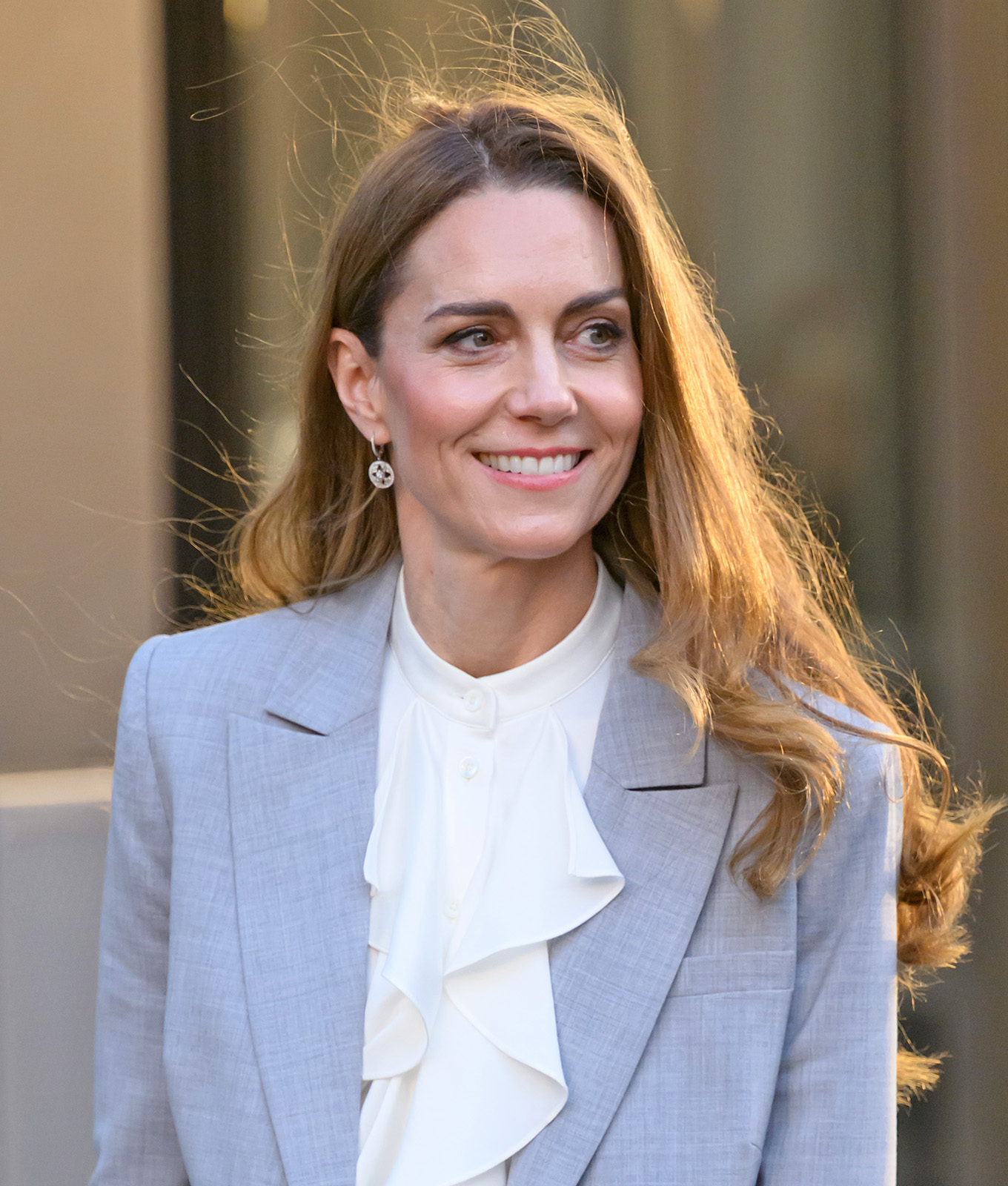 Kate Middleton on lighter hair: Middleton wearing a blue suit with backlit hair