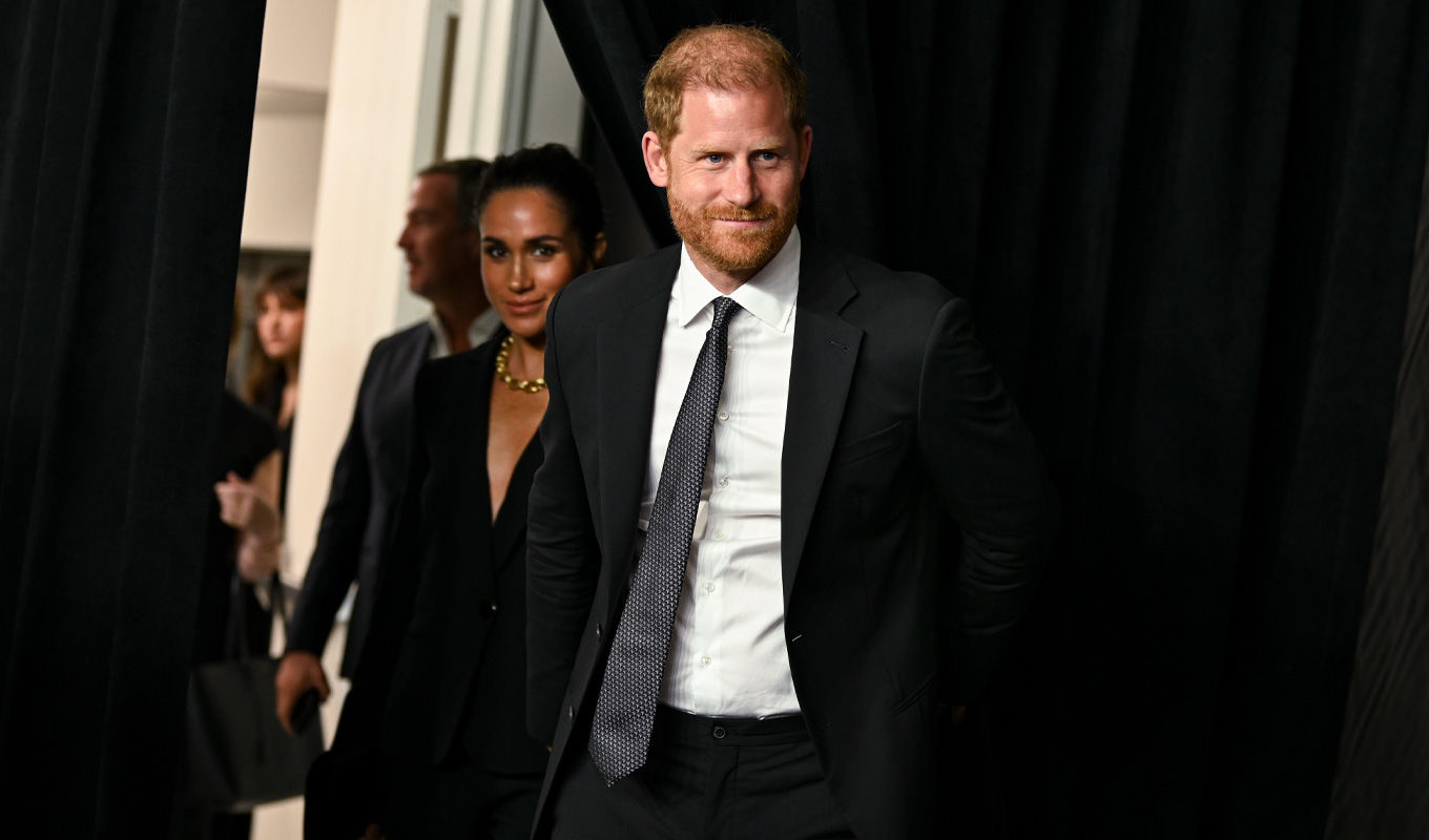 prince harry walking with meghan markle