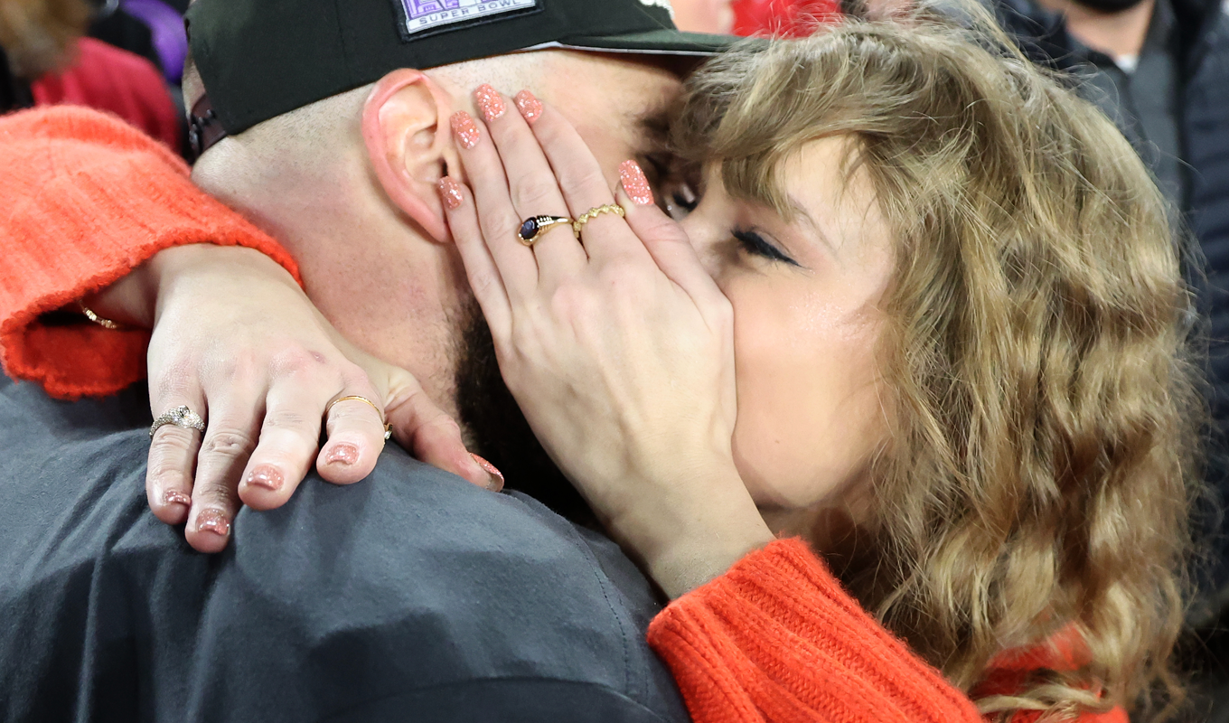 Mejuri Black Friday Sale: Travis Kelce and Taylor Swift kissing with her mejuri ring on
