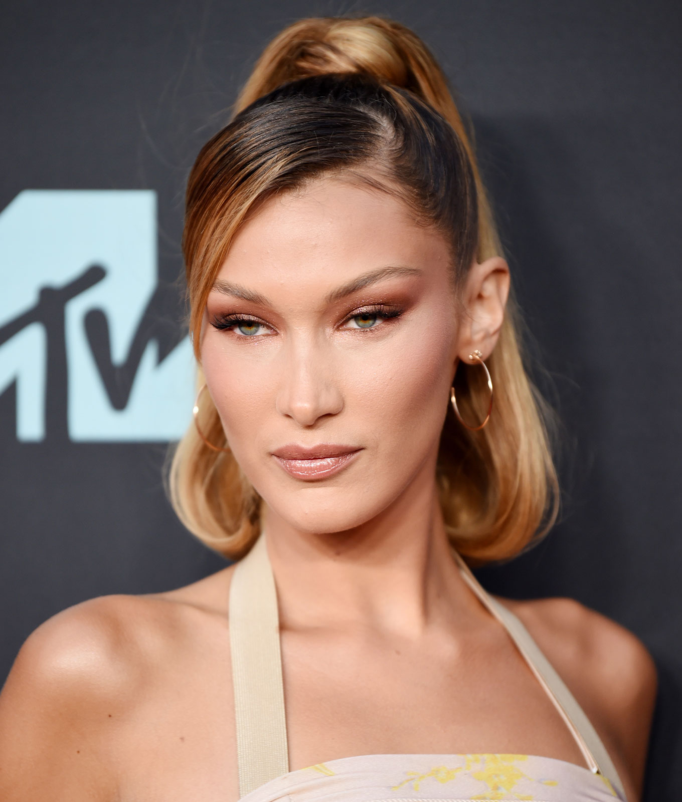 winter hair trends a photo of bella hadid and a sleek side sweep