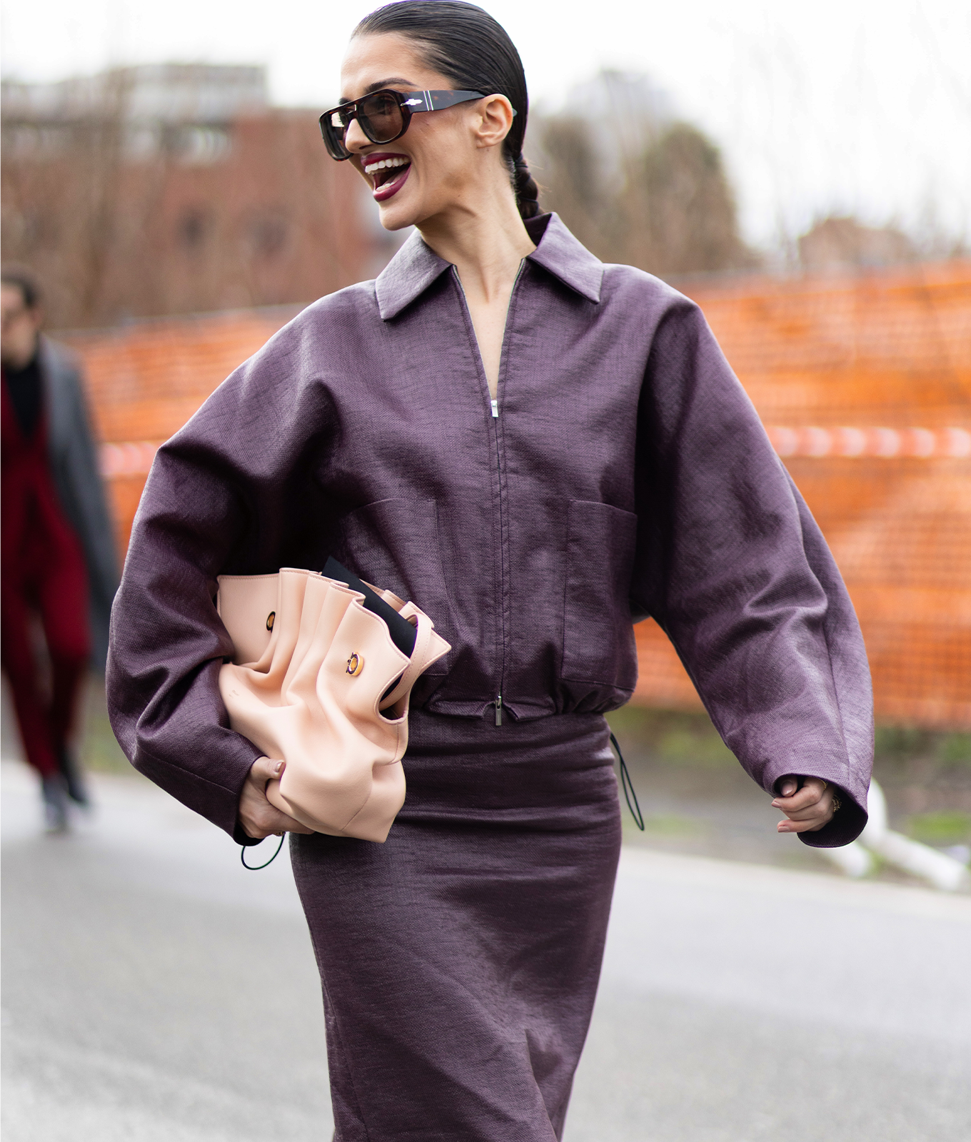 woman wearing deep plum purple winter color trends 2026