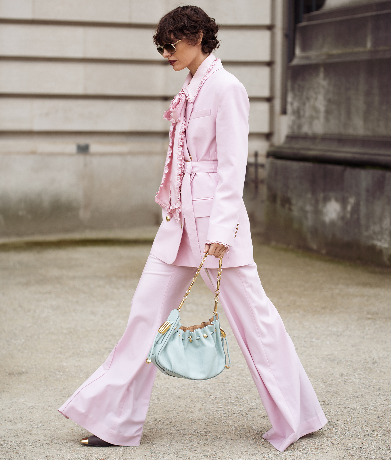woman wearing pastel pink winter color trends 2026