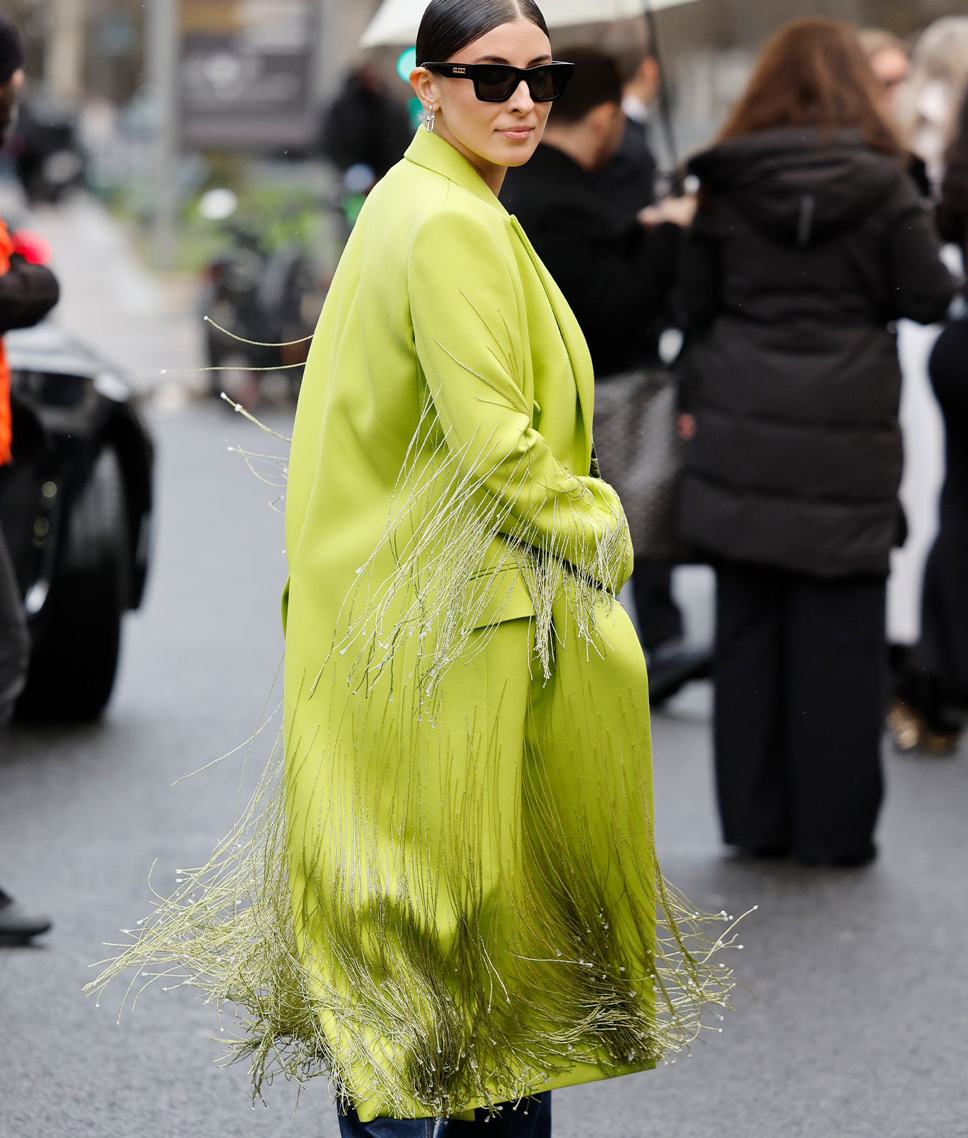 woman wearing peridot green chartreuse winter color trends 2026
