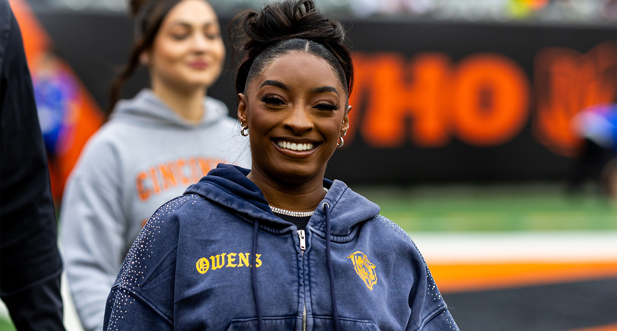 simone biles furry coat uni