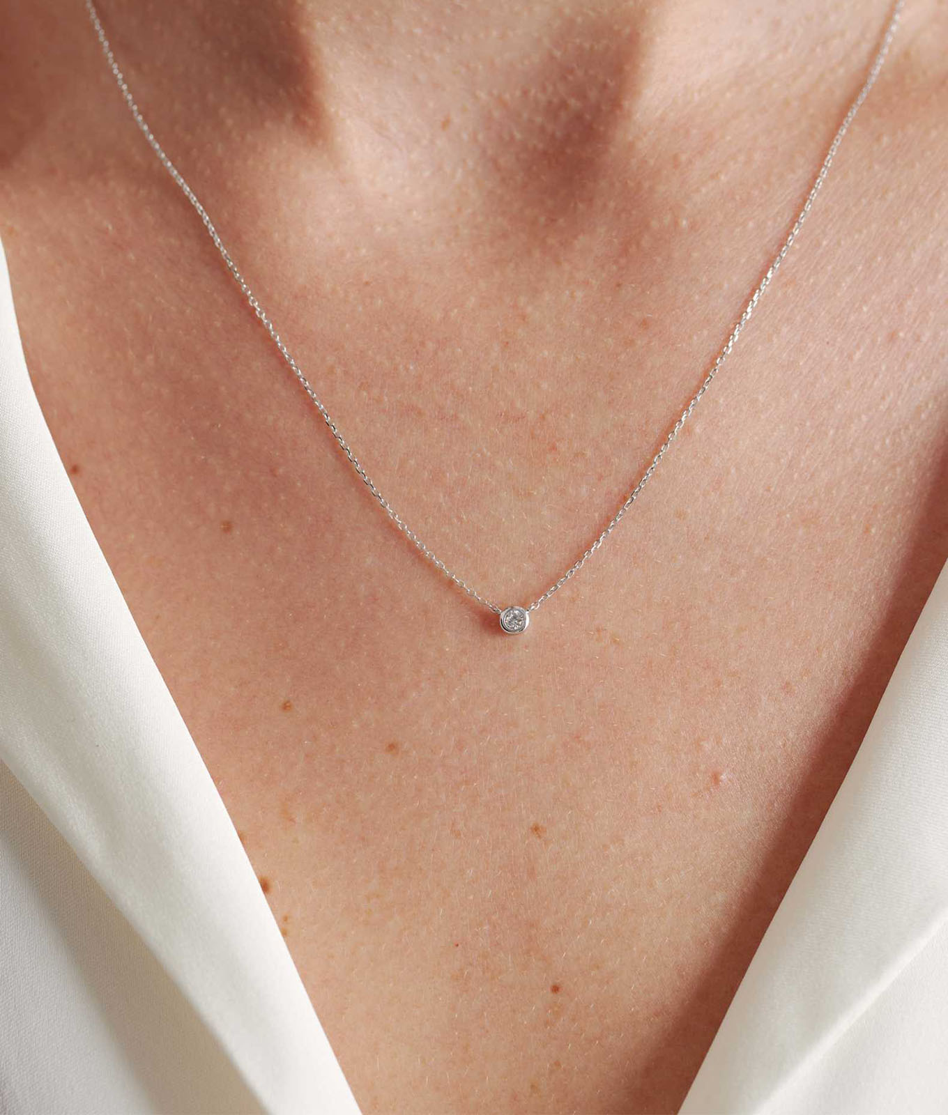The Quince 14K Gold Diamond Bezel Necklace.