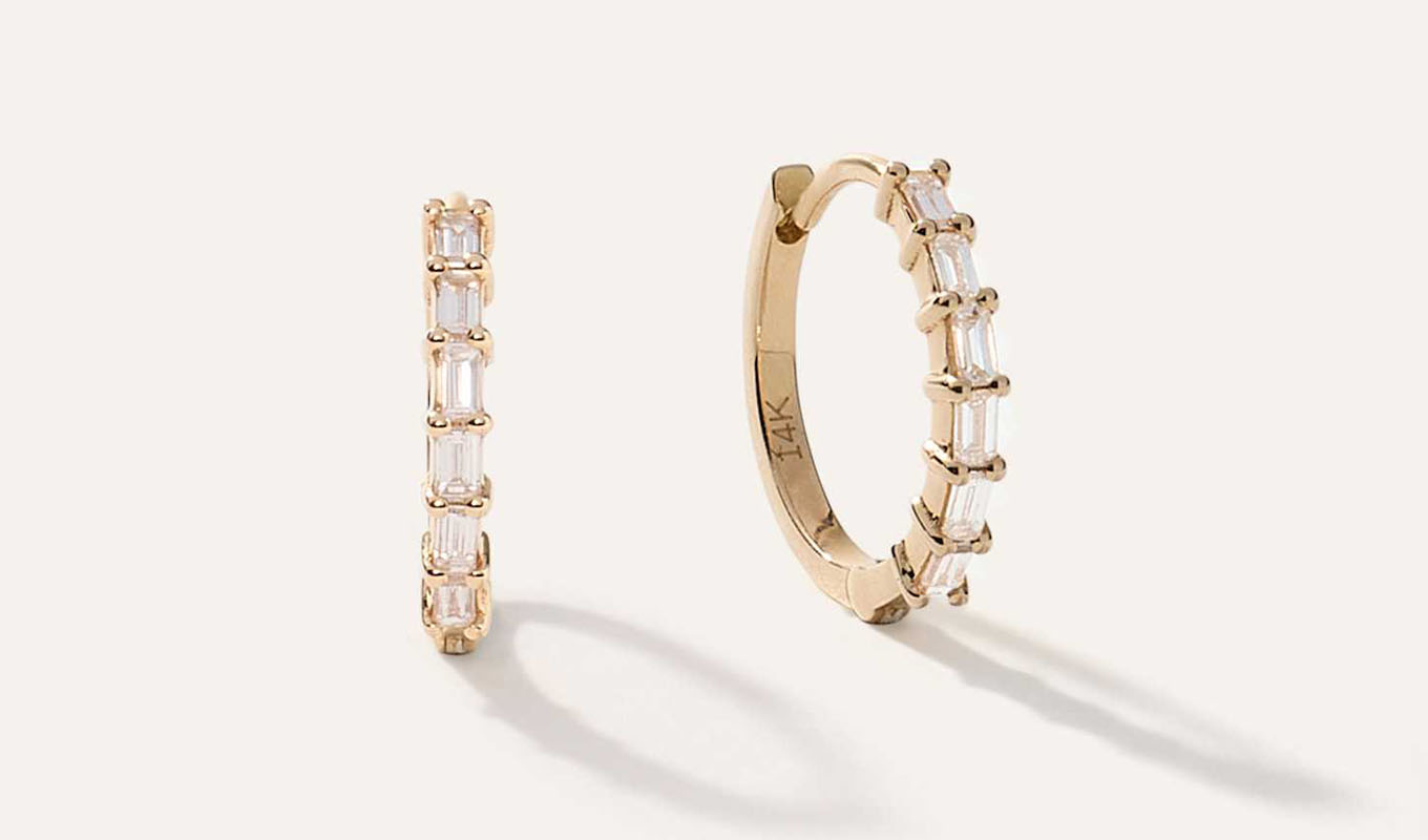 The Quince 14K Gold Diamond Baguette Huggies.