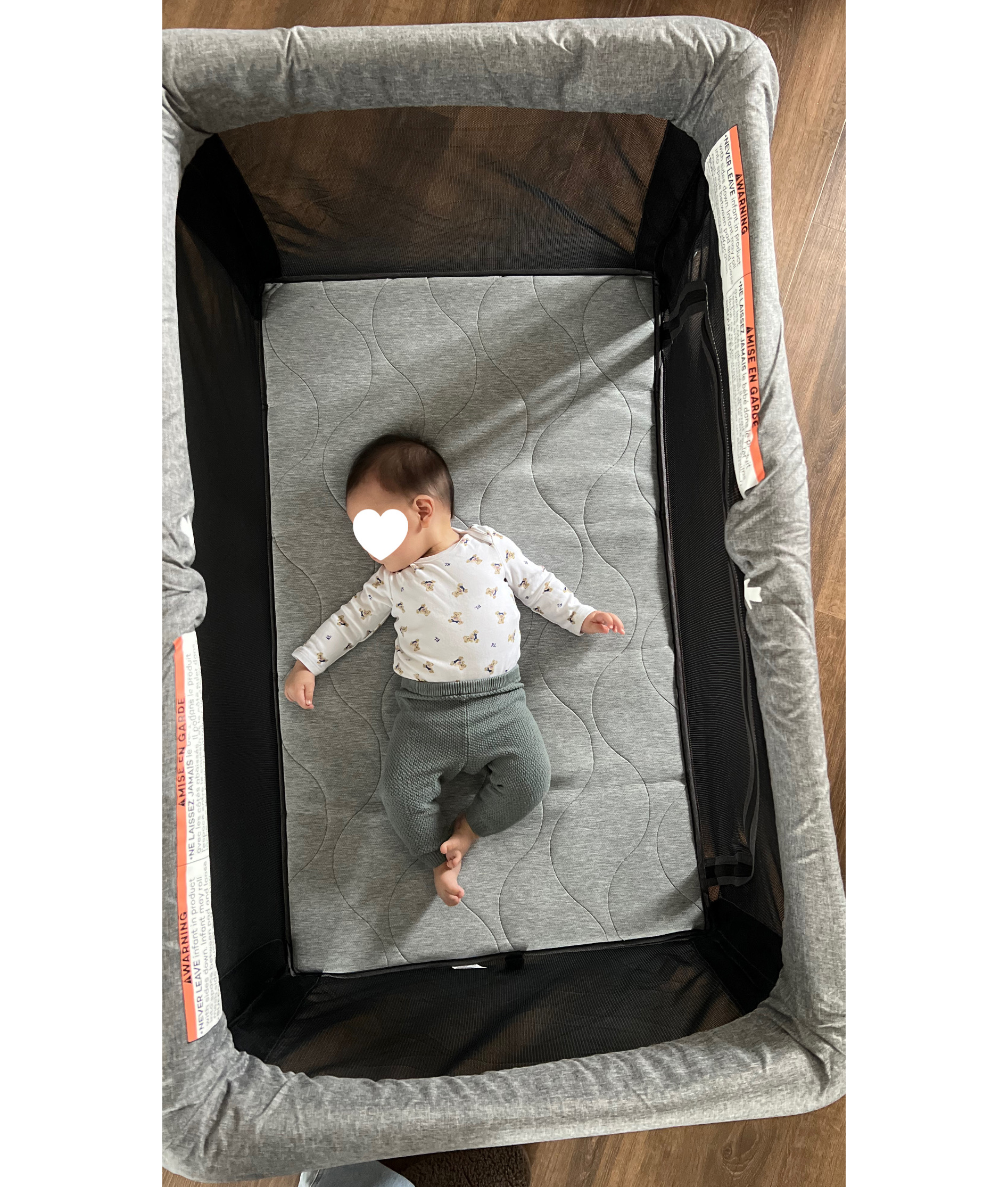 slumbergo with baby sleeping in it