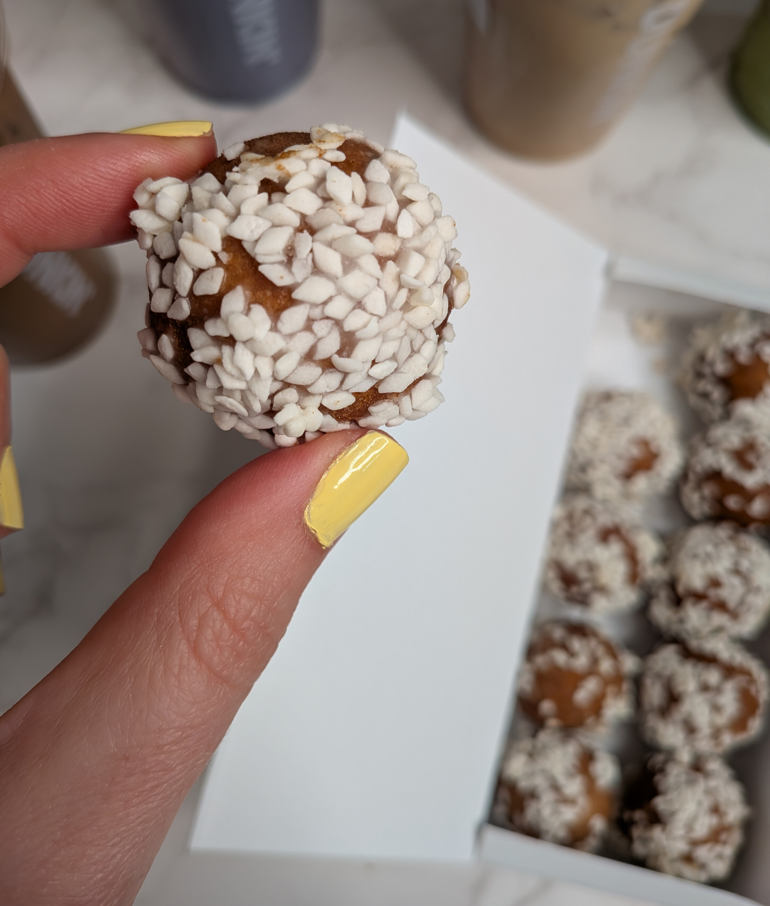 wedding cake munchkins held up