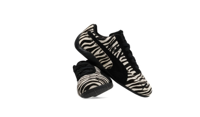 anne hathaway animal print sneakers: puma speedcat