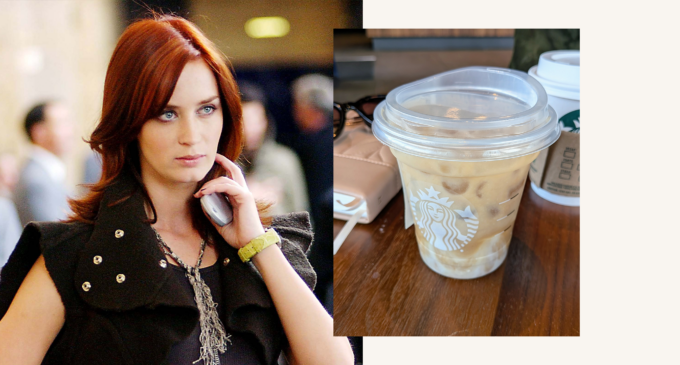 emily in character and next to her signature starbucks drink