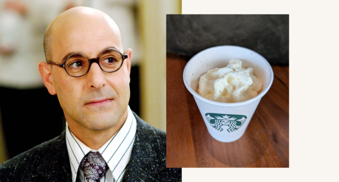 nigel from devil wears prada with drink