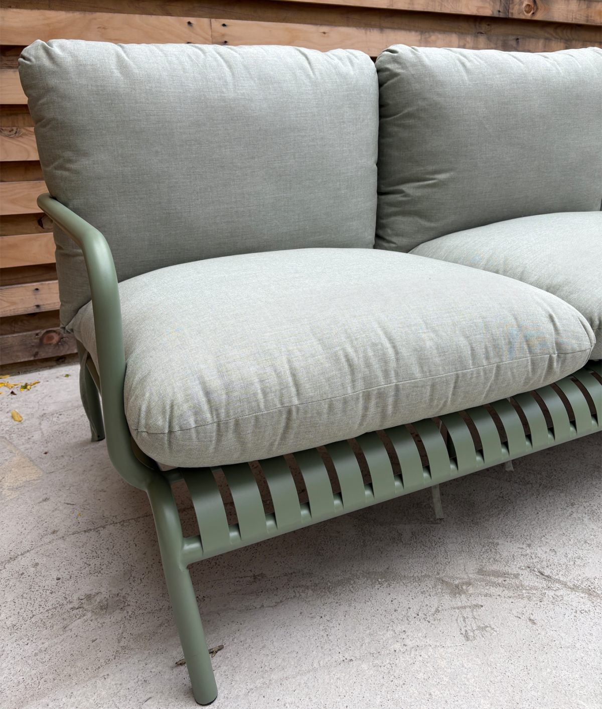 Article Sarek Outdoor Sofa Review: Original photo of green sofa cushions by Sally Herrod