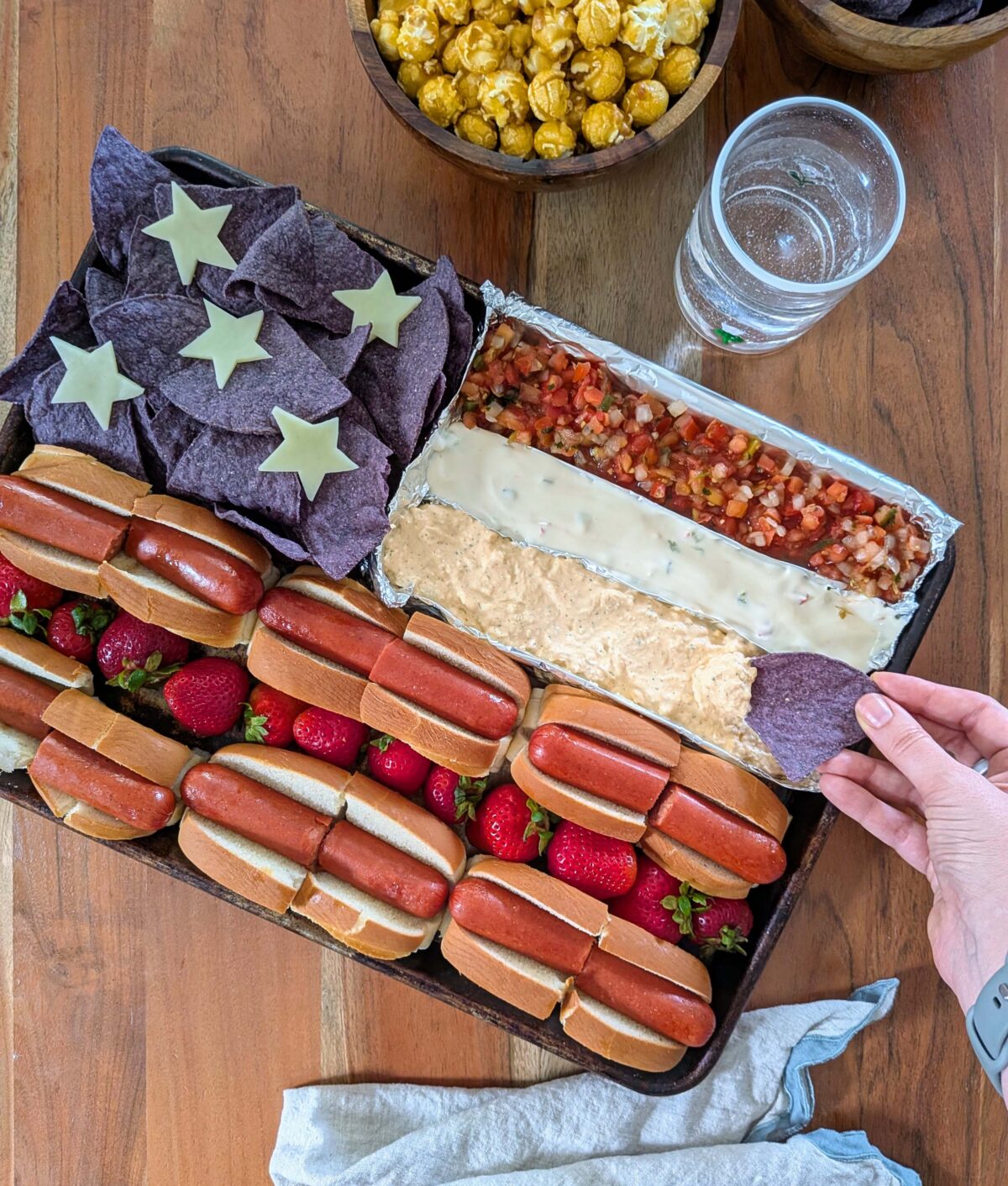 taking some buffalo chicken dip from the july 4th american flag snack board