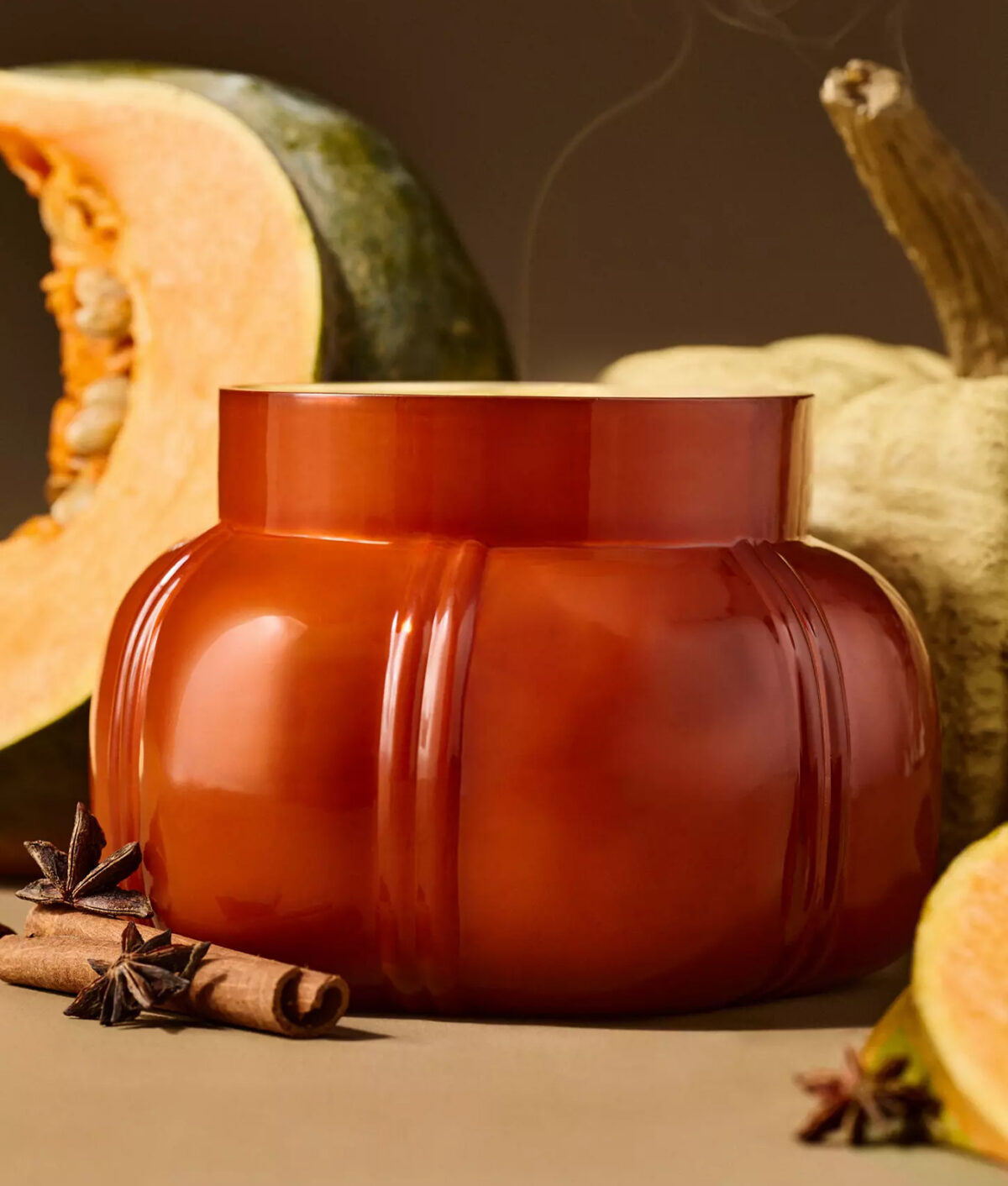 The Capri Blue Pumpkin Clove Glass Jar Candle.