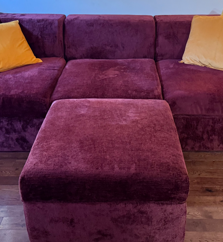 Cozey Atmosphere Sofa Review: Original photo of burgundy Cozey sofa by Stephanie Maida
