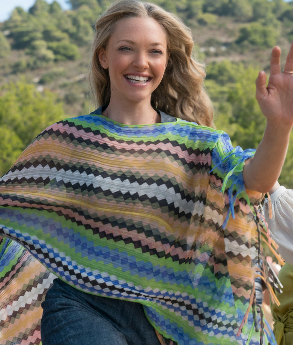Mamma Mia Fashion: Amanda Seyfried as Sophie in multicolored striped poncho