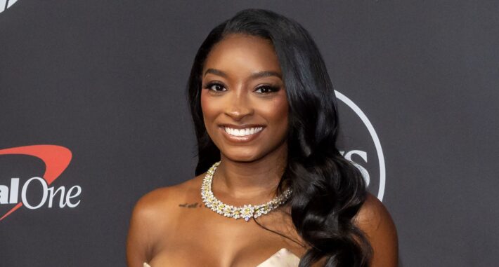 Simone Biles swim and heels 710x381