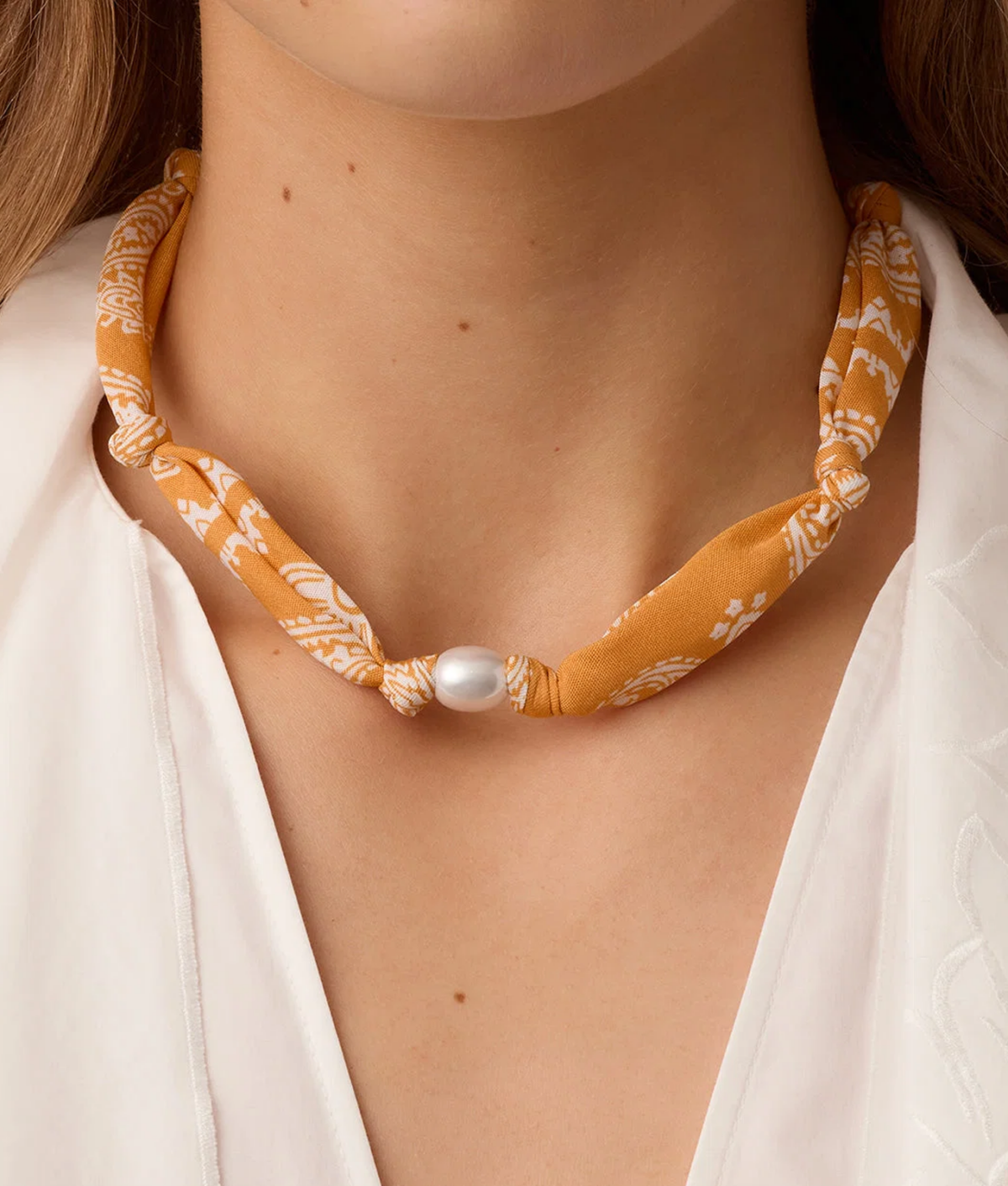 Paisley Bandana Print Fall Trend 2026: yellow bandana pearl necklace