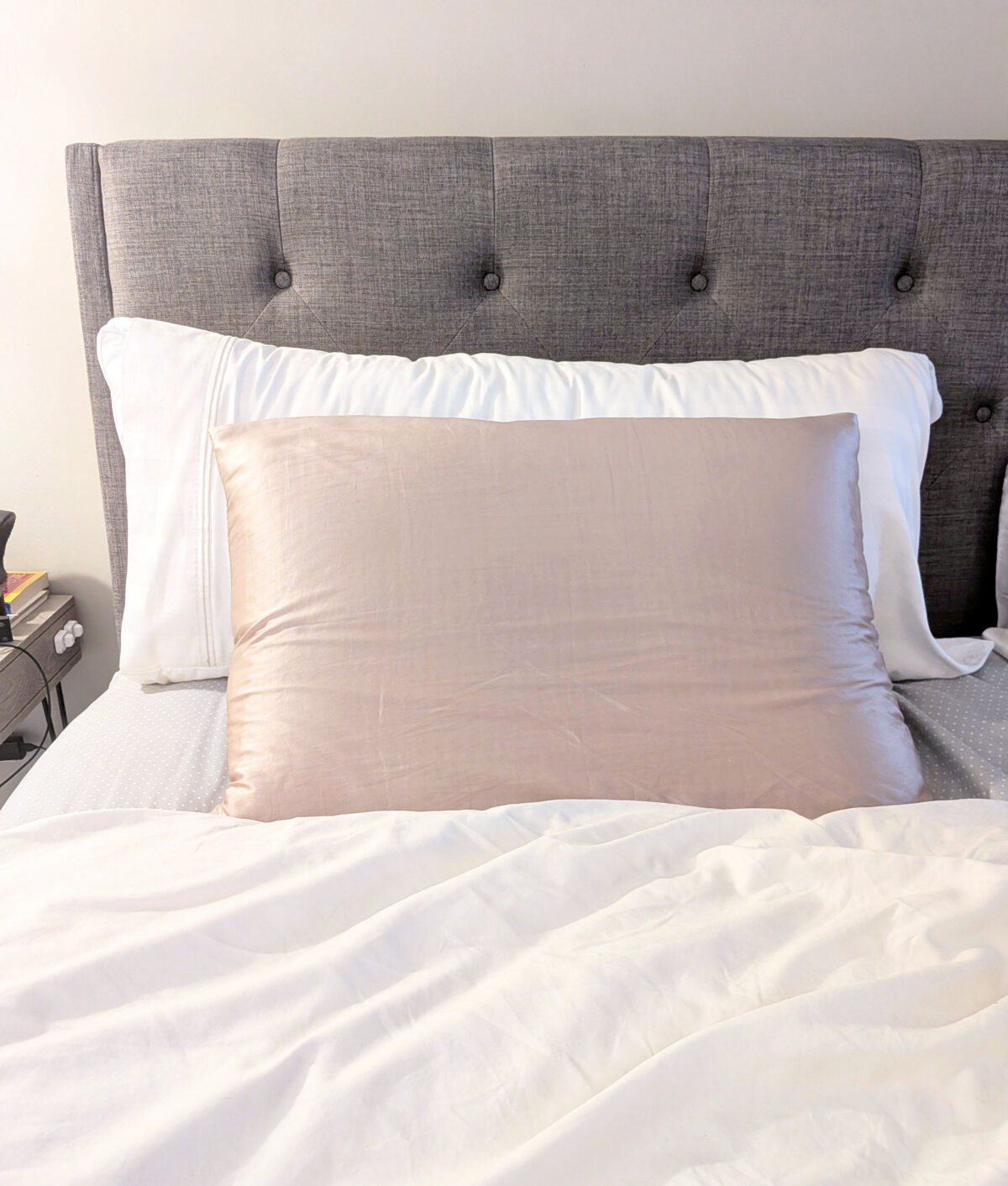 purple pillow on bed