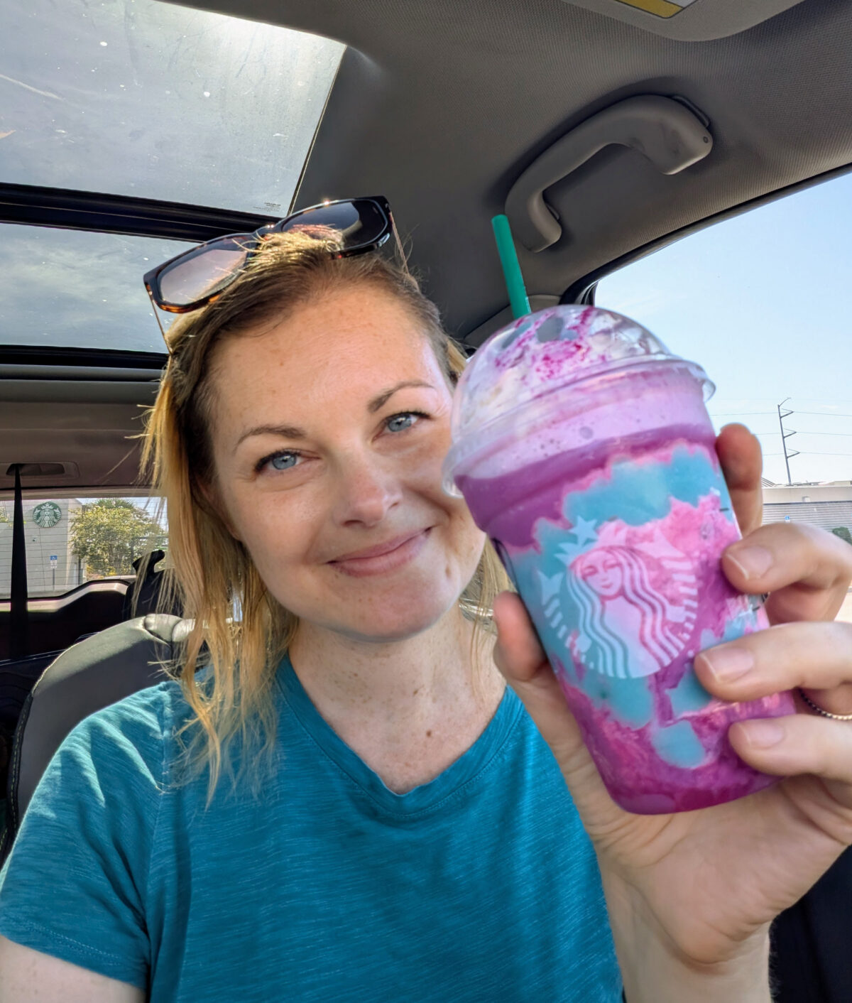 candace tasting the unicorn frappuccino