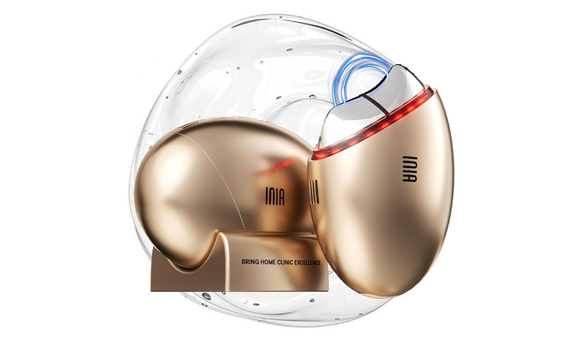 The Inia 7-in-1 Red Light Therapy Face and Neck Gua Sha Facial Device.