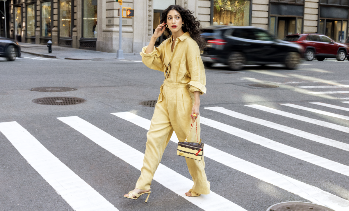 betty crocker cake bag worn by woman crossing the street