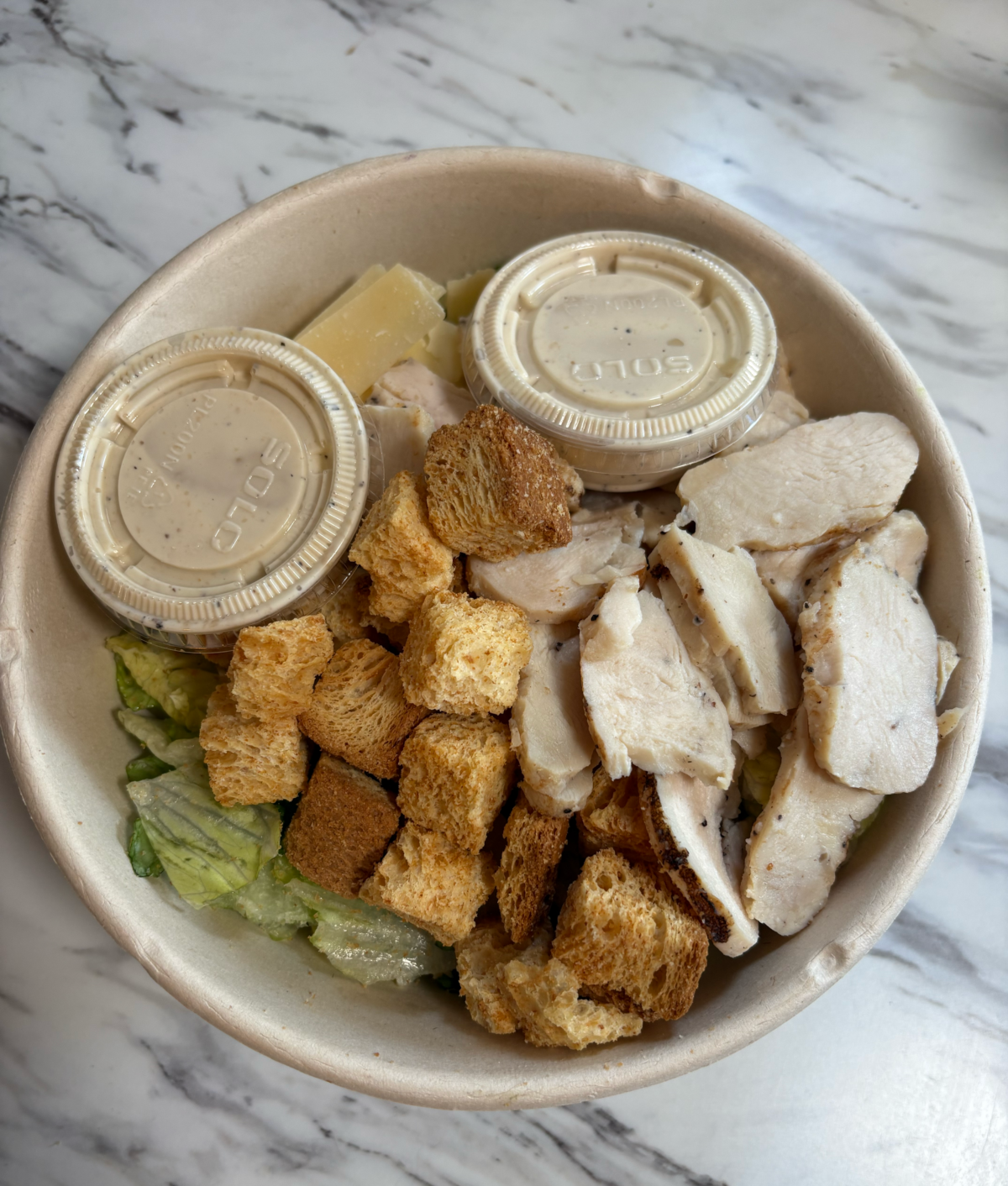 panera caesar salad in bowl