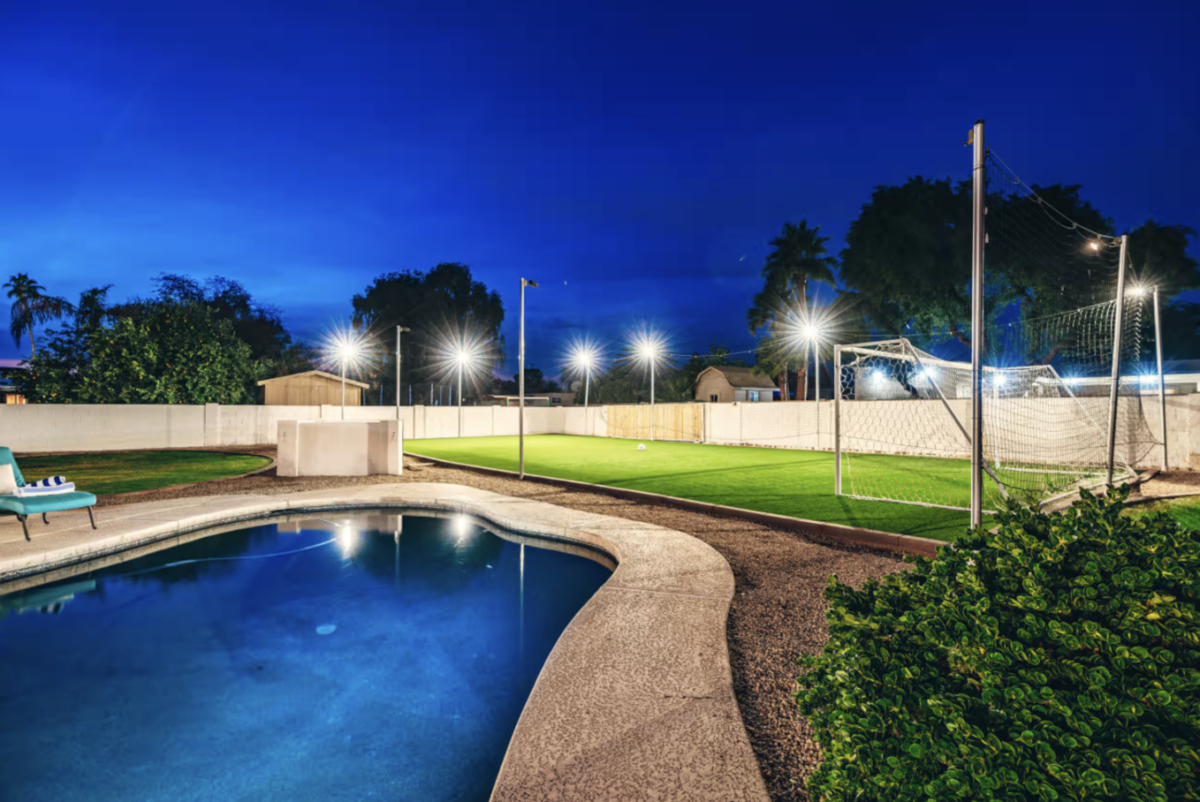 pool and soccer field at night