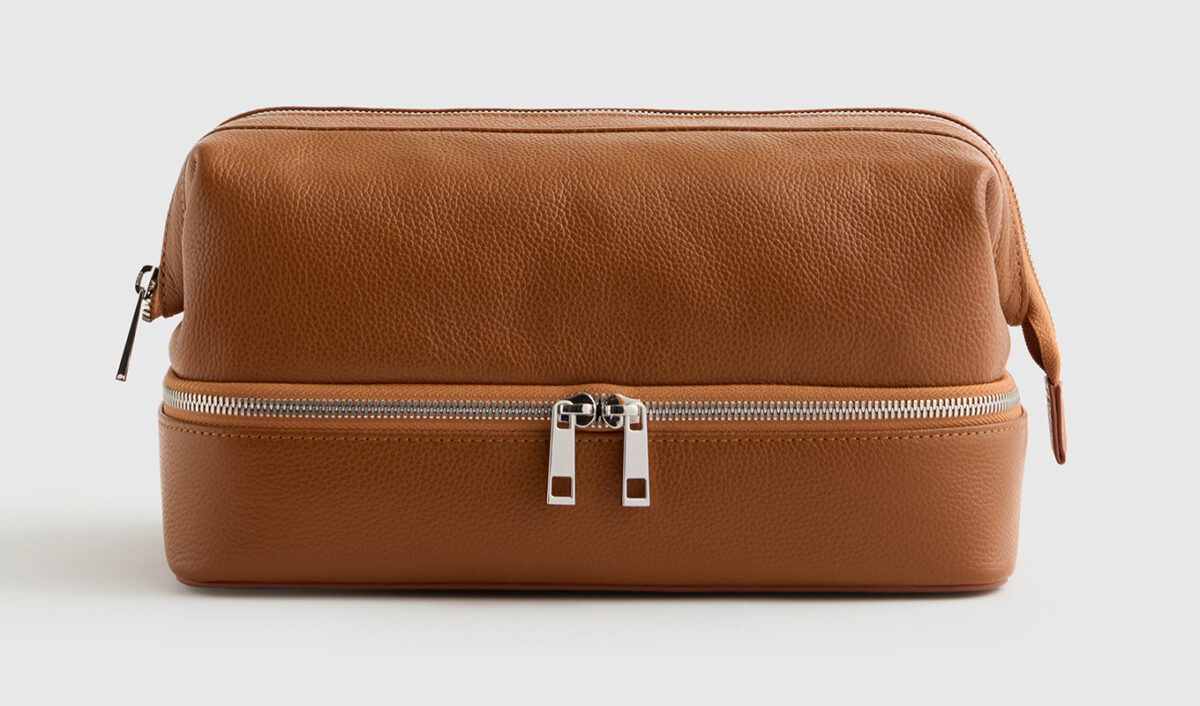 The Quince Italian Leather Dual Compartment Toiletry Bag.