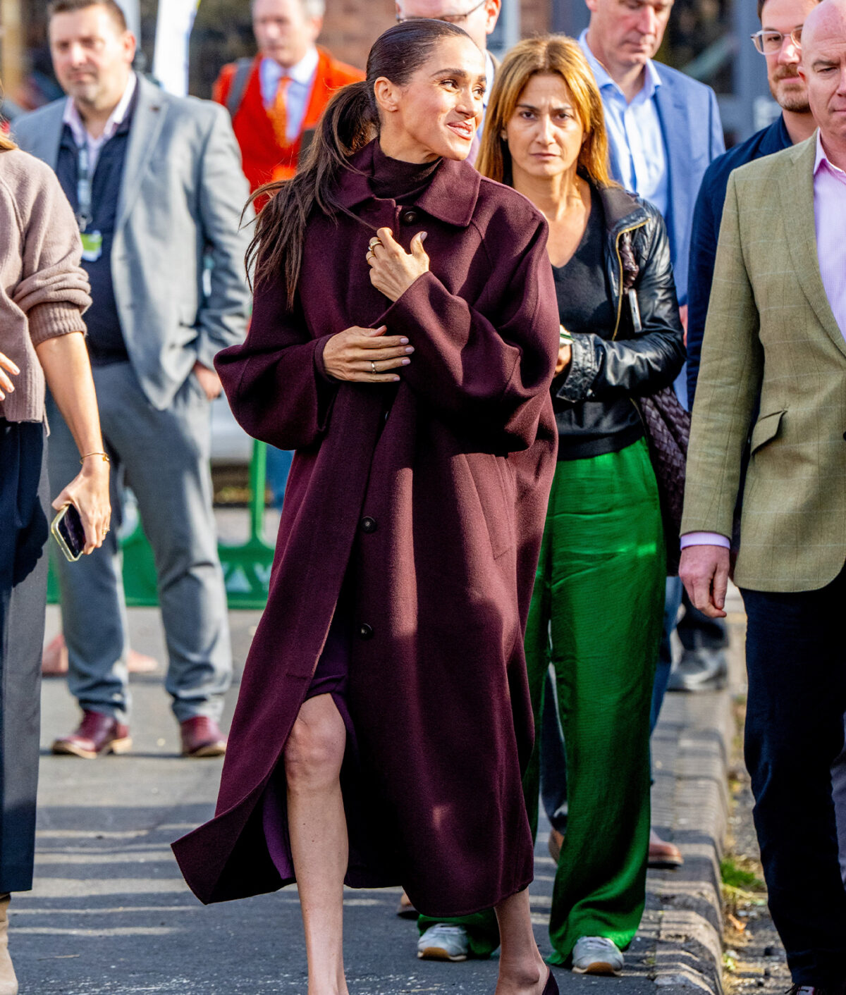 meghan markle first uk outing burgundy outfit